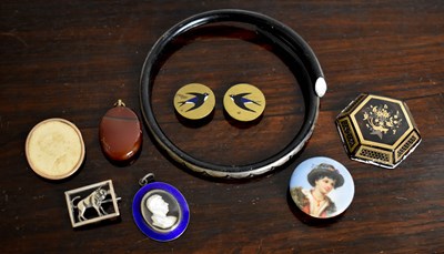 Lot 123 - A 19th century white metal, enamel and rock...