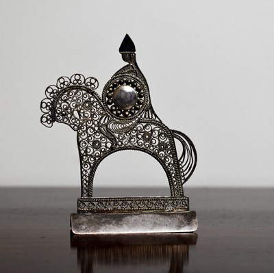 Lot 211 - A Continental white metal filigree work knight...