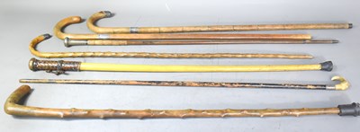 Lot 195 - A group of vintage walking canes to include...