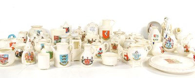 Lot 185 - A large group of crested china to include a...