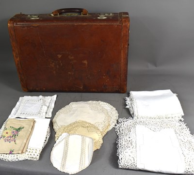 Lot 319 - A vintage leather travelling case together...
