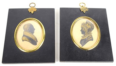 Lot 92 - Two Regency gilt highlighted silhouettes of a...