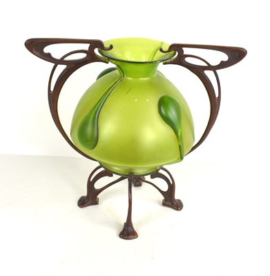 Lot 265 - An Art Nouveau style iridescent green glass...
