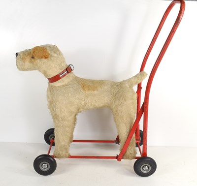 Lot 315 - A vintage Pedigree Toys push along fox terrier...
