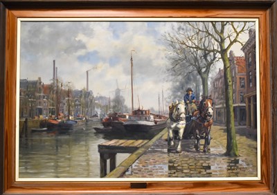 Lot 32 - H Welter (20th century): Dutch townscape with...