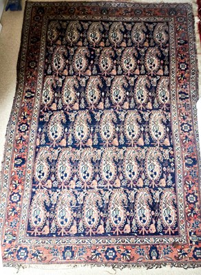 Lot 325 - An antique Middle Eastern wool rug, with boteh...