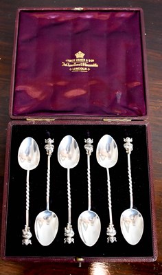Lot 209 - A set of silver 'Lincoln Imp' tea spoons by...
