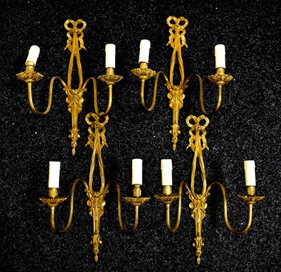 Lot 298 - A set of four French 20th century wall lights...