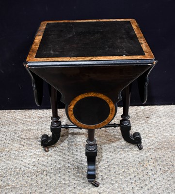 Lot 355 - A Victorian walnut and ebonised occasional...