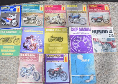 Lot 196 - A collection of vintage motorcycle manuals to...