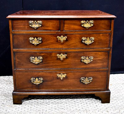 Lot 392 - A Georgian mahogany chest of drawers with two...