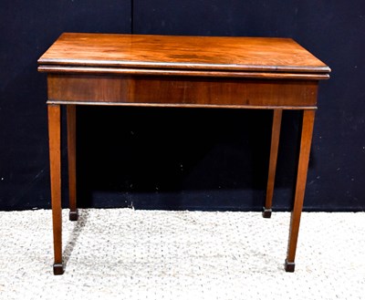 Lot 364 - A Georgian mahogany card table, with folding...
