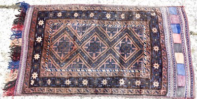 Lot 333 - An antique Middle Eastern carpet bag, with...