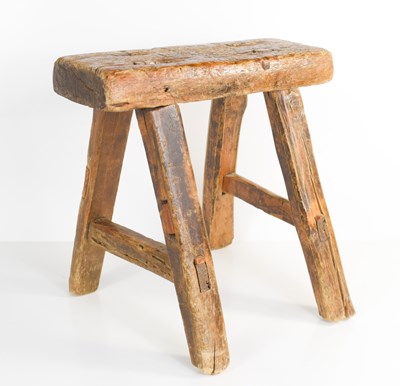 Lot 398 - A 19th century rustic jointed wooden stool,...