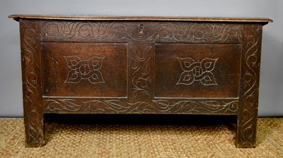 Lot 339 - An 18th century oak coffer with two plank top...