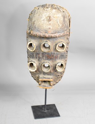 Lot 303 - A Grebo (Kru) six eyed warrior face mask with...