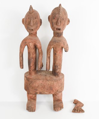 Lot 304 - A traditional African wooden sculpture...