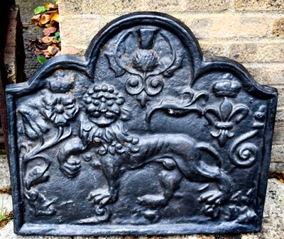 Lot 335A - An antique style cast iron fire back,...