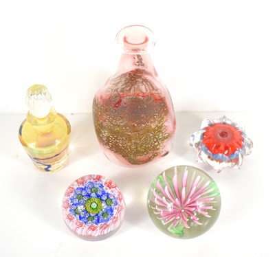 Lot 259 - A group of three glass paperweights to include...