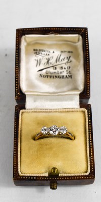 Lot 84 - An 18ct gold and diamond ring, the three...