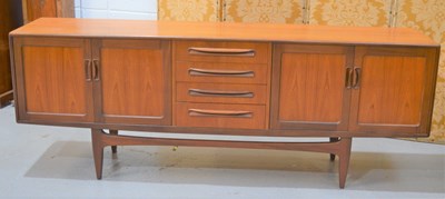 Lot 398 - A large Mid-Century G-Plan four drawer teak...