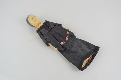Lot 13a - A 19th century Grodnertal penny wooden doll,...