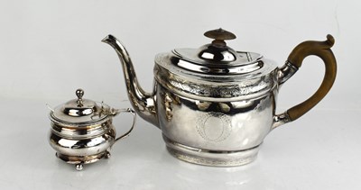 Lot 33 - A George III silver tea pot with bright cut...