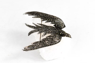 Lot 311 - An Art Deco, large swallow brooch studded with...