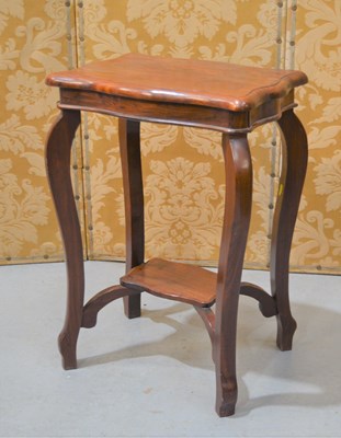 Lot 370 - A small rosewood occasional table with shaped top