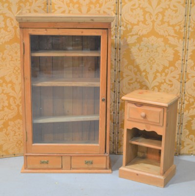 Lot 384 - A large antique pine glazed cabinet with...