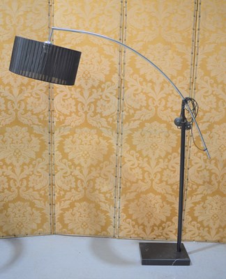 Lot 277 - An arc form lamp standard in chrome with black...