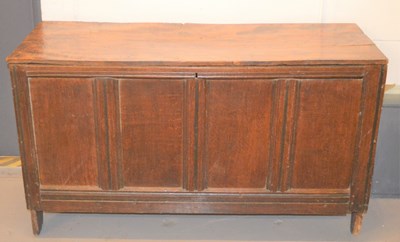 Lot 392 - An 18th century oak and elm coffer, the arch...