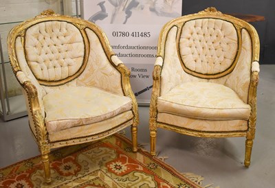 Lot 394 - A pair of modern French style gilt wood...