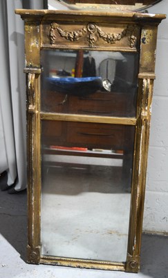 Lot 383 - A 19th century pier mirror, the upper frieze...