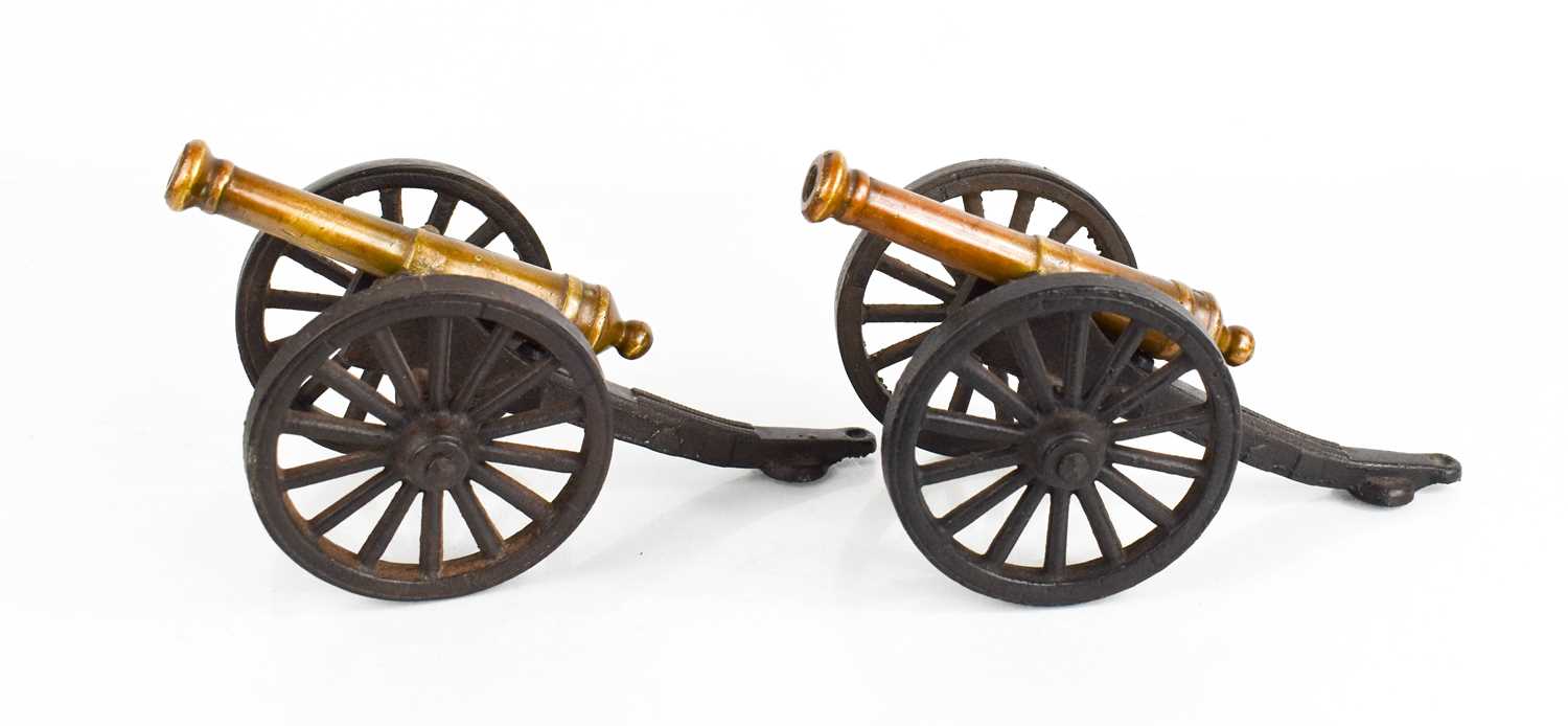 Lot 233 - A pair of antique model cannons, in bronze and...