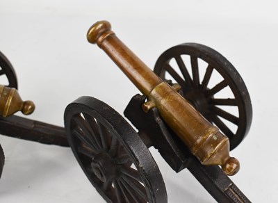 Lot 233 - A pair of antique model cannons, in bronze and...