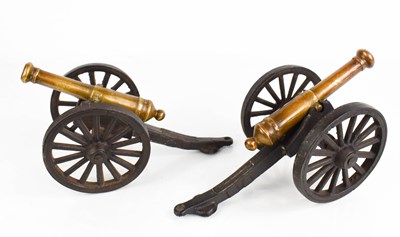 Lot 233 - A pair of antique model cannons, in bronze and...