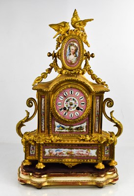 Lot 239 - A French spelter and porcelain mantle clock,...