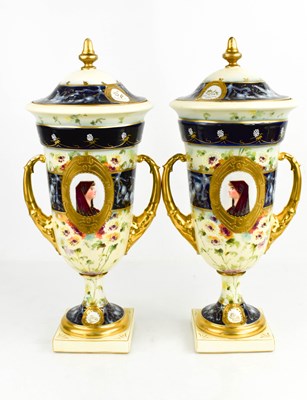 Lot 161 - A pair of German Rudolstaat urns with covers,...