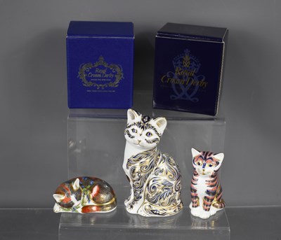 Lot 162 - Three Royal Crown Derby cats, two with boxes.