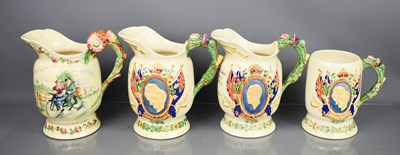 Lot 177 - Four Crown Devon Musical jugs, a George VI &...