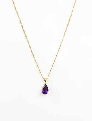 Lot 426 - A 9ct gold and amethyst pear drop pendant...