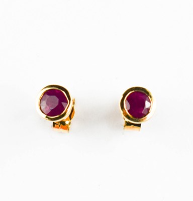 Lot 418 - A pair of 18ct gold and ruby stud earrings.