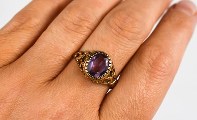 Lot 367 - A 9ct gold vintage ring set with an oval...