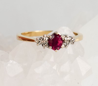 Lot 415 - A 9ct gold, ruby and diamond ring, size N½, 2.2g.