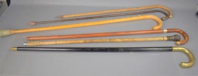 Lot 255a - A group of vintage walking sticks to include a...