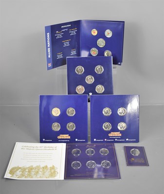 Lot 204 - A group of commemorative coin packs to include...