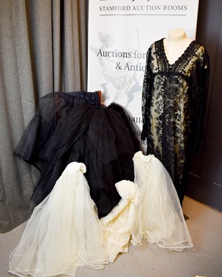 Lot 482 - An early 20th century black lace overlay dress...