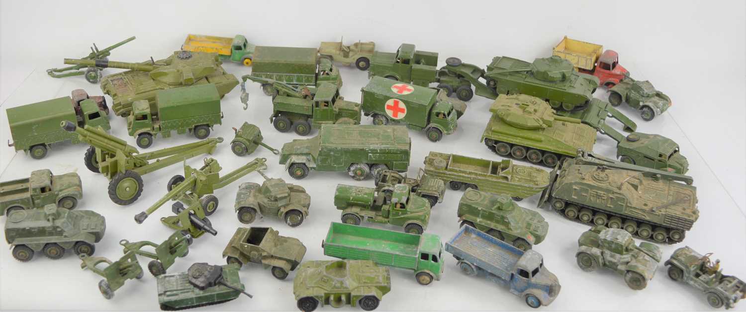 Lot 65 - A collection of Dinky diecast army tanks,...