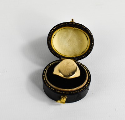 Lot 399 - A 9ct gold signet ring, the oval face engraved...